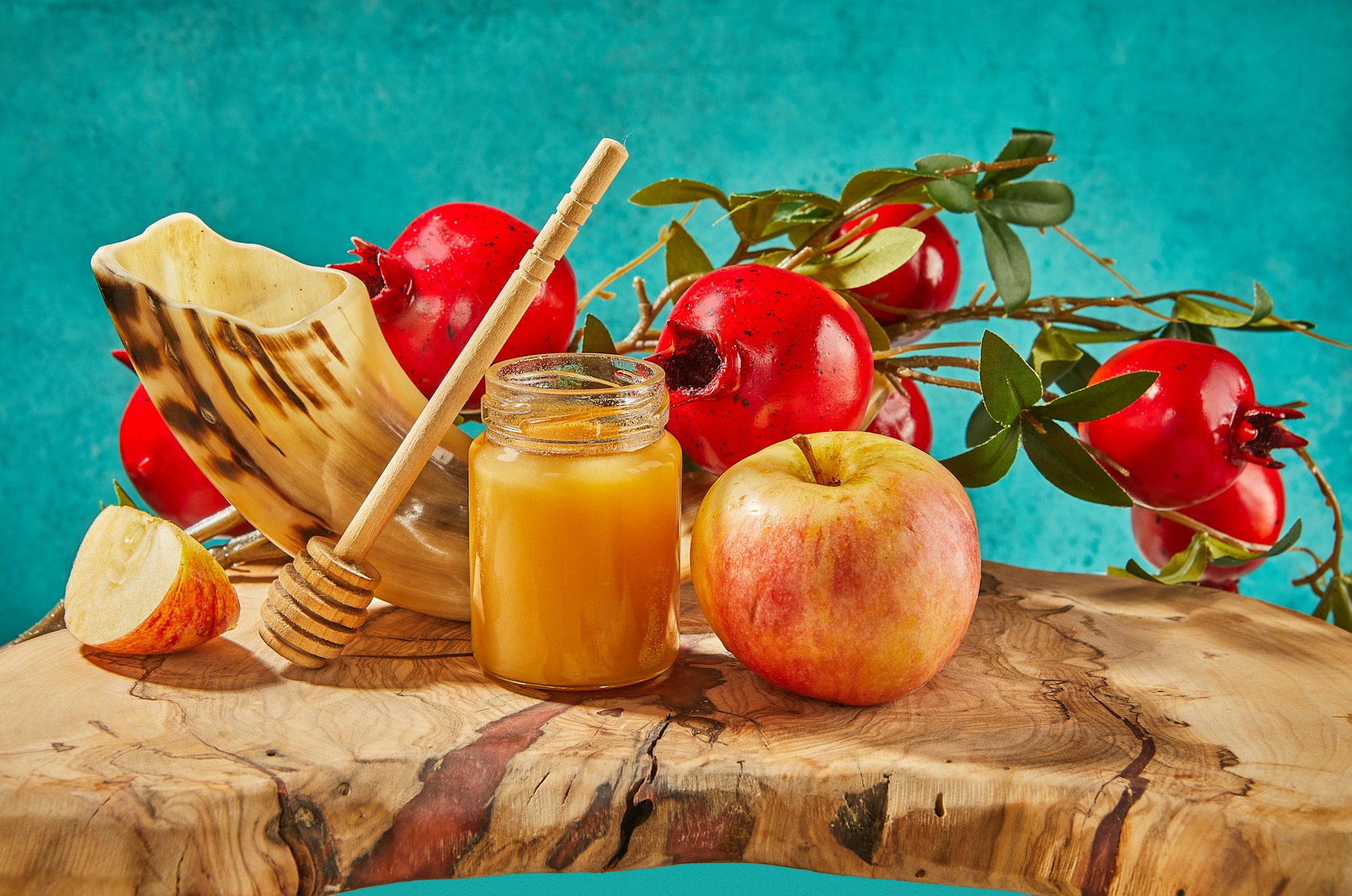 Rosh hashanah - jewish new year holiday concept. Bowl in the shape of an apple with honey